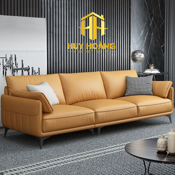 Sofa văng da bò màu vàng nghệ hiện đại, thiết kế tối giản, sản phẩm nội thất từ xưởng Sofa Huy Hoàng.